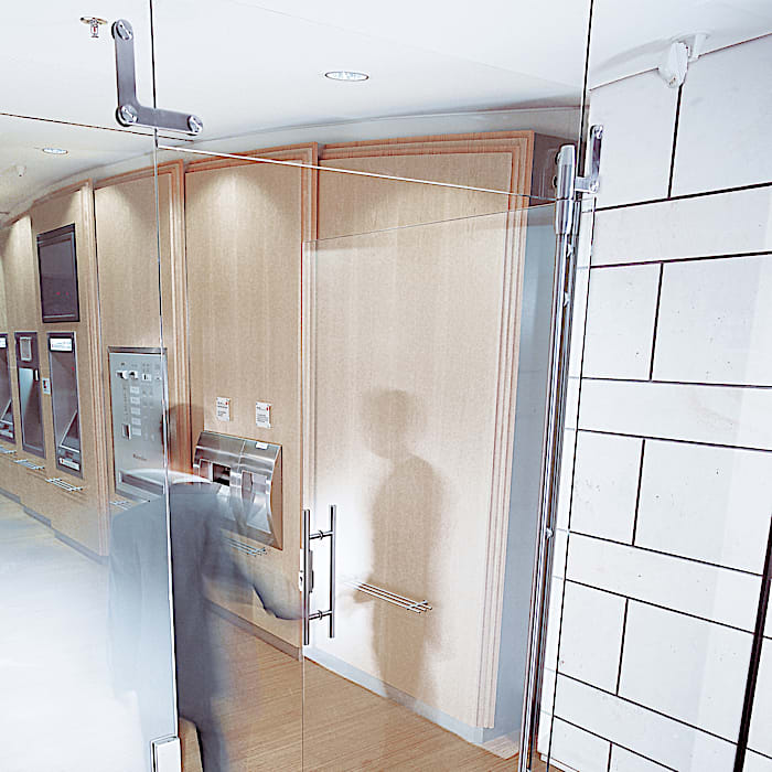 Point-fixed fitting system MANET for toughened glass assemblies